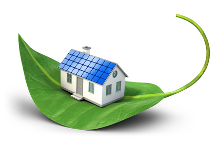 Solar cell house icon on green leaf - Alternative energy